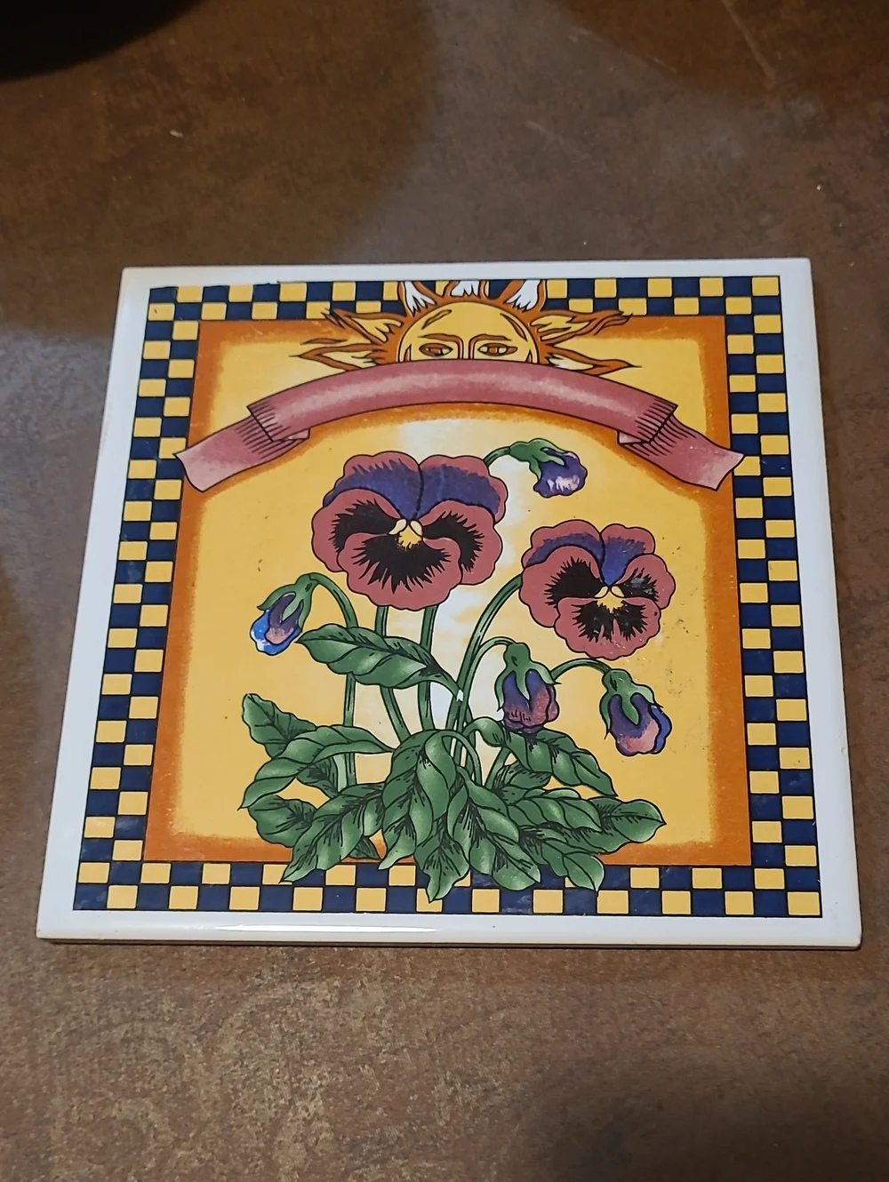 Ceramic tile floral pansy plaque or trivet in gold, red, green and navy, 6